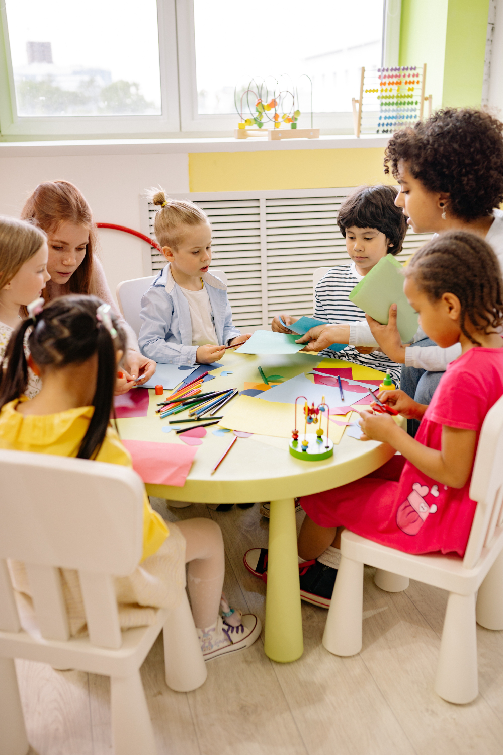 Kids engaged in studying materials as part of a preparatory program