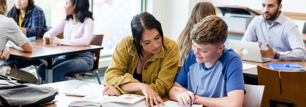 Reading Tutors Vancouver helping child improve literacy skills with guided reading session