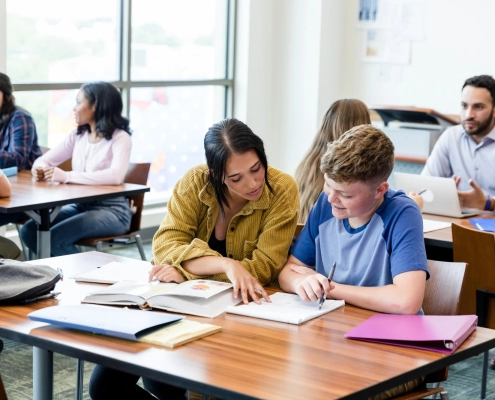 Reading Tutors Vancouver helping child improve literacy skills with guided reading session