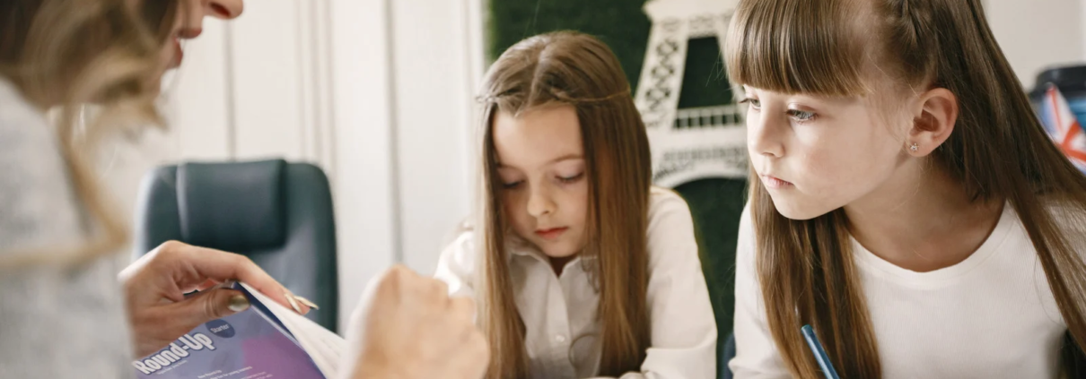 tutor holding book and give tutoring services in Richmond